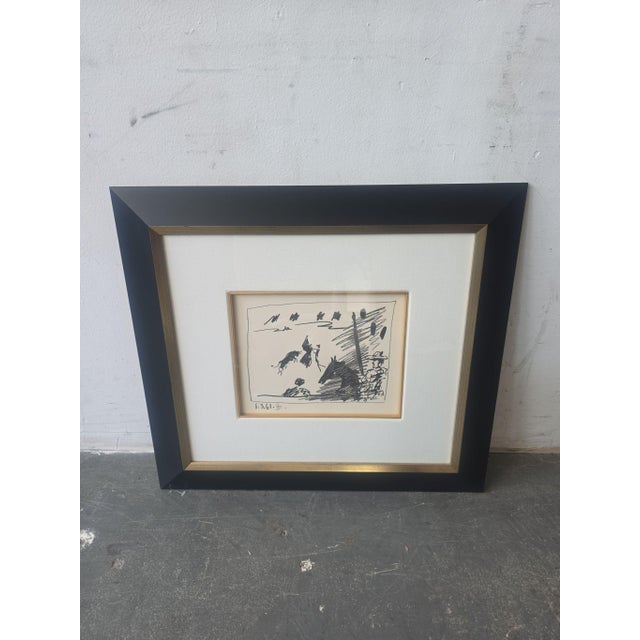 Original lithograph in black ink on creme wove paper by Pablo Picasso. Titled Cap games, Dated 6.3.61 in the stone.This...