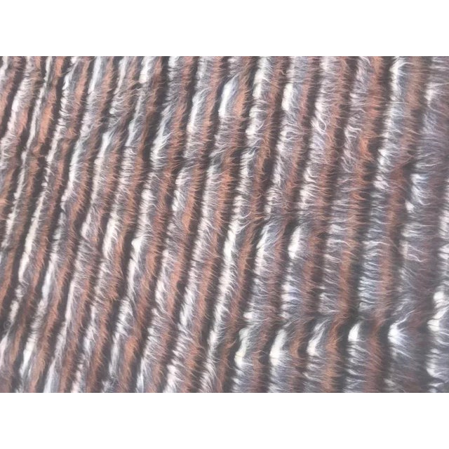 Very beautiful tribal rug from Morocco, with a woven soft goat hair pile, entirely handwoven with wool on cotton foundation.