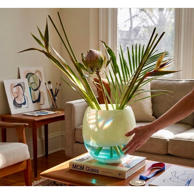 In the world of mid-century glass, scale is everything. This 10-inch diameter centerpiece globe is a masterclass in the...