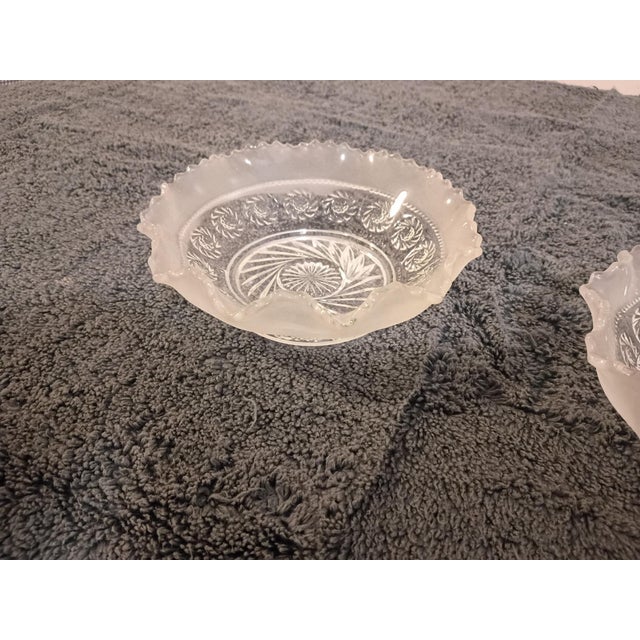 A charming pair of vintage pressed glass bowls with satin-frosted, hand-ruffled rims and a sawtooth edge. Inside, a ring...