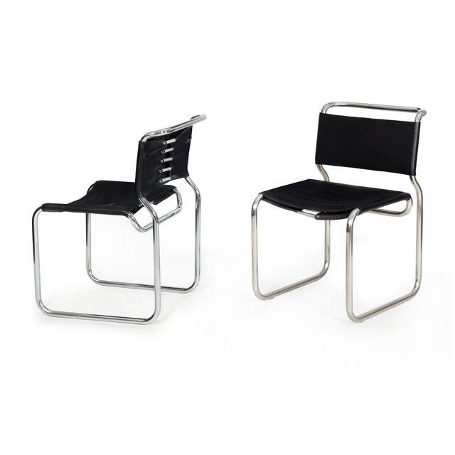 PAIR OF DOUBLE-CANTILEVER BLACK LEATHER "CH66" DINING CHAIR BY NICOS ZOGRAPHOS United States, circa 1970s Item #...