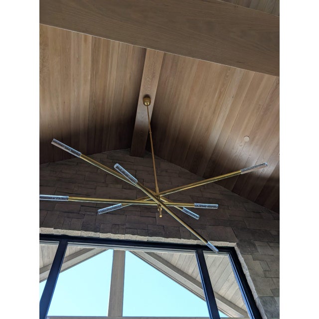 Antique-burnished brass and seeded-glass Rousseau Grande chandelier Visual Comfort. Designed by Kelly Wearstler. Eight...
