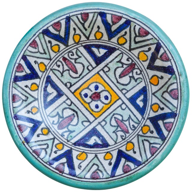 Handcrafted ceramic plate featuring an elaborate hand-painted Moorish pattern in a traditional Andalusian color...