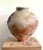 A large stoneware tsubo (jar) made in the tradition of Shigaraki ware by celebrated Japanese potter Shiro Tsujimura...