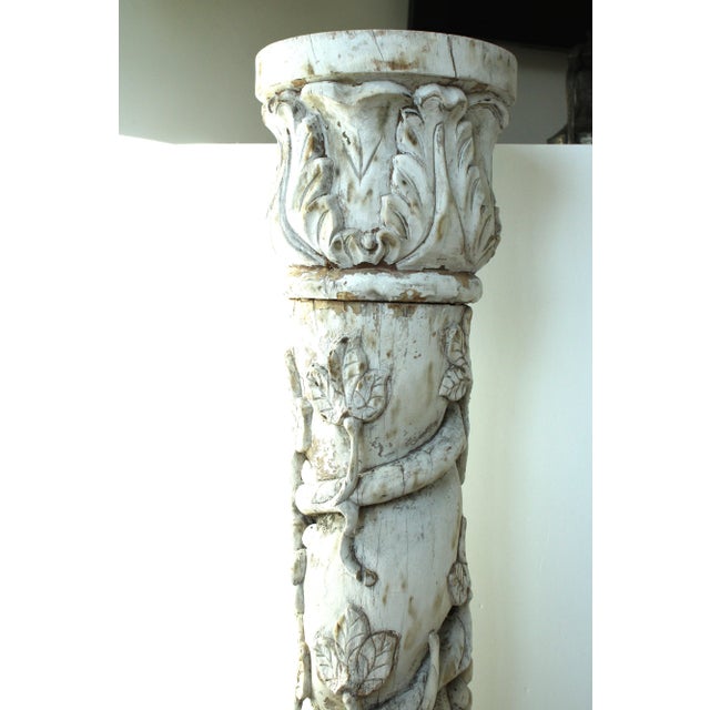 1940's Carved European pedestal column in weathered white. Exceptional trailing vines and acanthus leaf carvings...