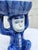 A whimsical blue and white porcelain or ceramic Chinoiserie monkey dish in the French Singerie tradition (human-like...