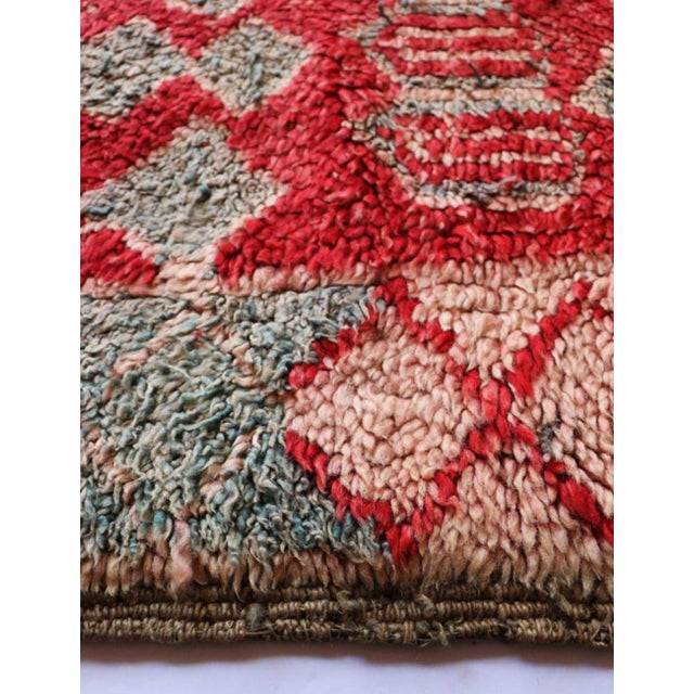 Collectible Vintage Moroccan Rug – Handwoven Tribal Expression This authentic vintage Moroccan rug is a powerful example...