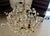 Categorized as French Maison Baguès-style or botanical, this fixture evoke a mid-century modern or "Hollywood Regency"...