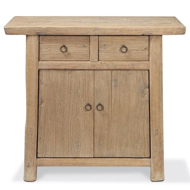 Constructed with reclaimed elm beams in a traditional style, this natural finish cabinet exudes a timeless charm. The...