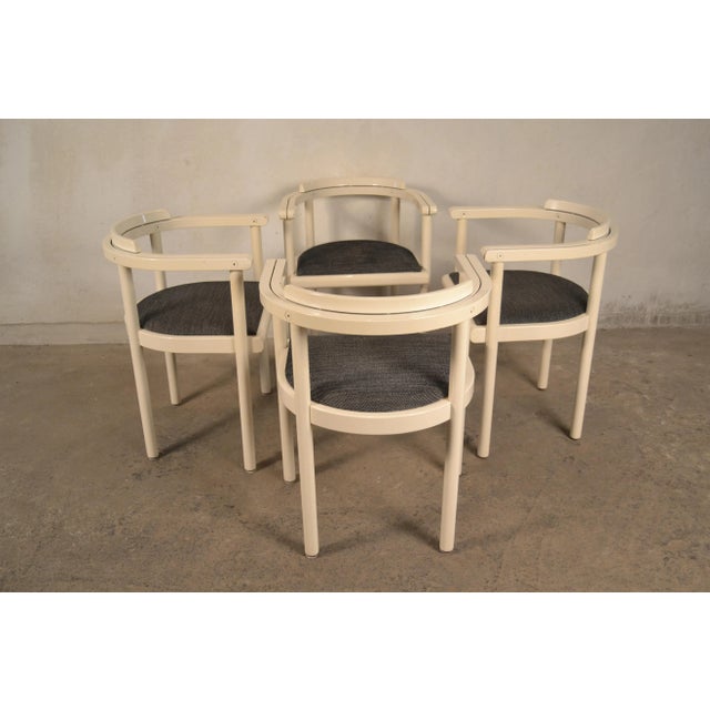 This set of four chairs was designed by Johannes Nørgaard for Nørgaard Møbelfabrik, Denmark, in the 1970s. The chairs are...