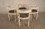 This set of four chairs was designed by Johannes Nørgaard for Nørgaard Møbelfabrik, Denmark, in the 1970s. The chairs are...