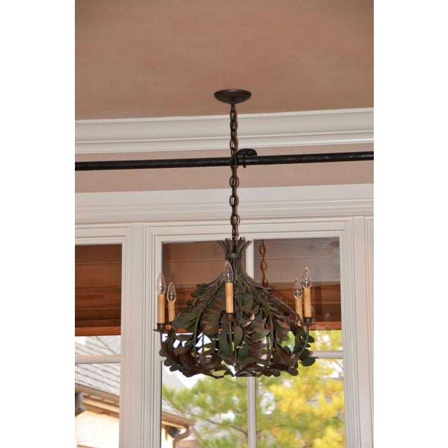 This was purchased from Antique Warehouse in Tulsa, OK. I love that this chandelier is interesting and eclectic. It has...