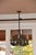 This was purchased from Antique Warehouse in Tulsa, OK. I love that this chandelier is interesting and eclectic. It has...