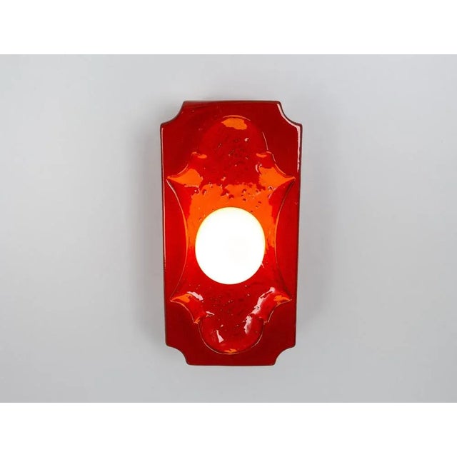 Pair of ceramic red wall lights, sputnik style, made in germany, 1970s heavy quality and in very good condition. Cleaned,...