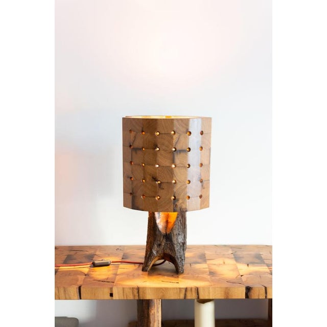 26-06 table lamp by timothée musset unique dimensions: d 19 x w 28 x h 50 cm materials: oak all our lamps can be wired...