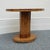 An Art Deco centre table by Harry & Lou Epstein. Burr walnut veneered oval table top with fluted burr walnut central...