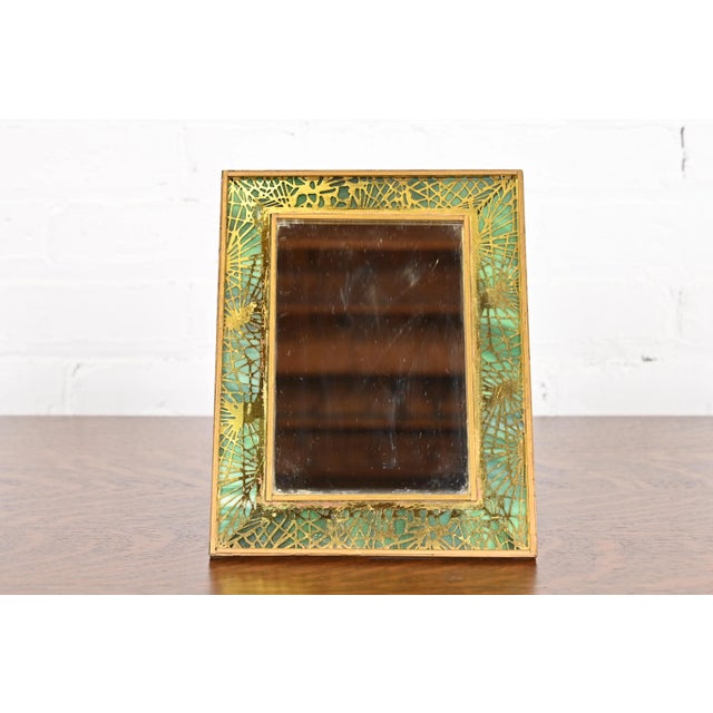 A rare and outstanding antique Arts & Crafts period Pine Needle framed mirror By Tiffany Studios (signed en verso) New...