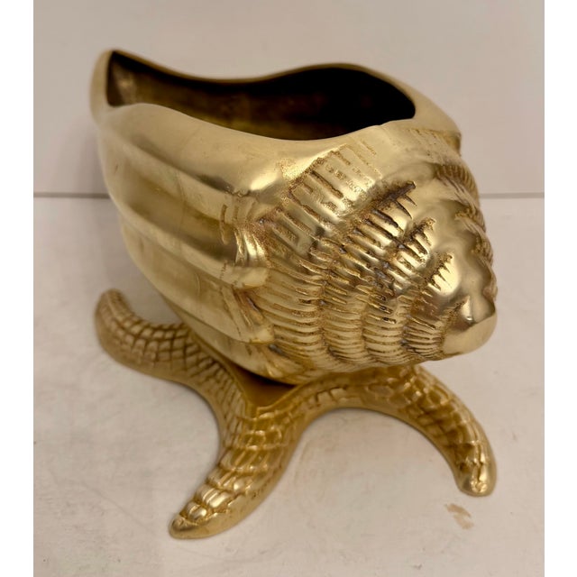 Large brass sea shell planter on starfish base. Very unusual design with nice detail. nice hand polished finish. Light...