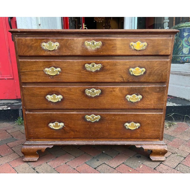 Great American walnut chest on ogee bracket feet with graduated drawers and molded top with a nice warm mellow color and...