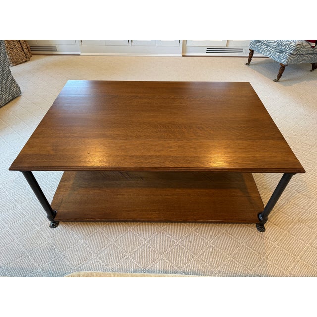 This is a very gently used two tiered oak coffee table with very solid iron frame and beautiful petite claw feet. It was...