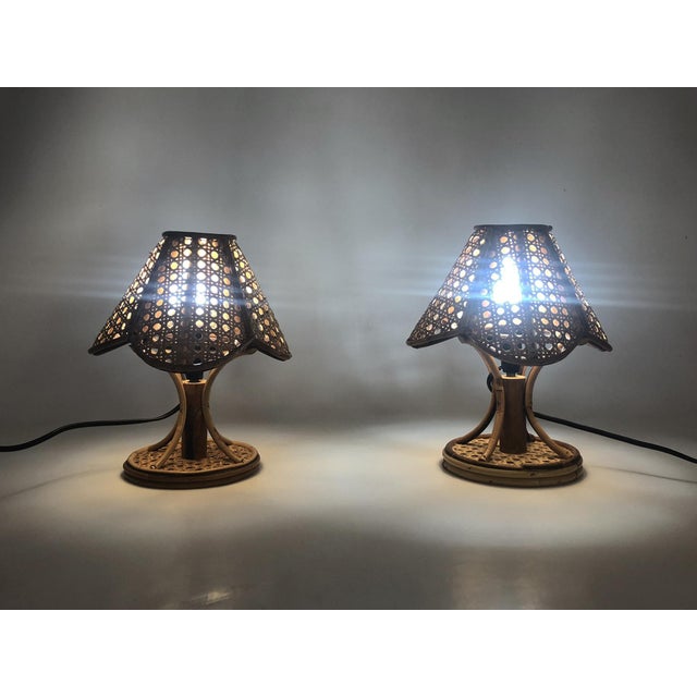 Pair of bamboo, rattan, and cane lamps. Italy, 1950s-60s A beautiful pair of rattan, bamboo, and cane lamps, crafted by...