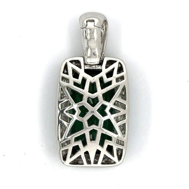 18k White gold pendant with cushion cut, vivid green tourmaline weighing approximately 20.00 carats and 70 round billiant...