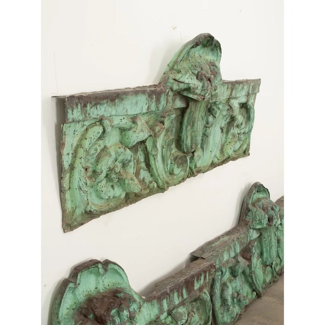 This 19th century set of three oxidized copper panels are an incredible addition to any space. The deep relief...
