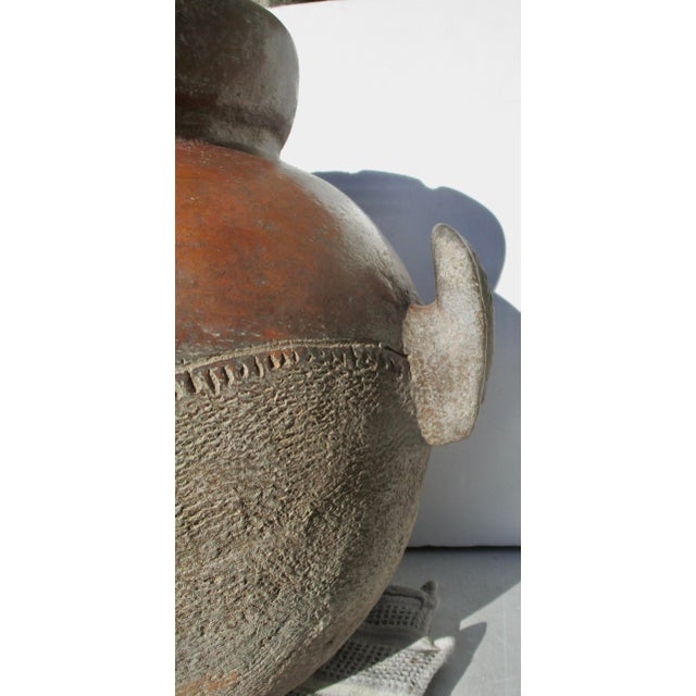 Nuna People circa 1900 storage Jar, Classic shape form, surface decoration, and building material. Heavy, handmade walls,...