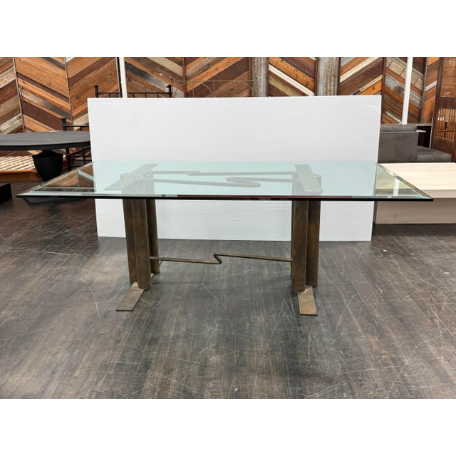 Design Plus Gallery presents a Bespoke Glass + Sculpture Base Dining Table. This custom dining table pairs a thick...