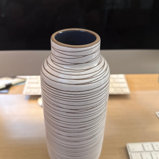 Design Plus Gallery presents a Heath Ceramics Sausalito Striated Ceramic Vase. This ceramic vase has a tall cylindrical...