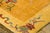 Hand-knotted in wool, this 3x6 contemporary Chinese Deco runner presents a golden-yellow field framed by a delicate...