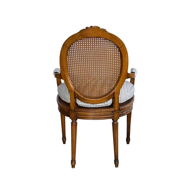 Pair of Early 1900s Louis XVI Style Carved Walnut Arm Chairs With Caned Back & Seat For Sale - Image 4 of 11