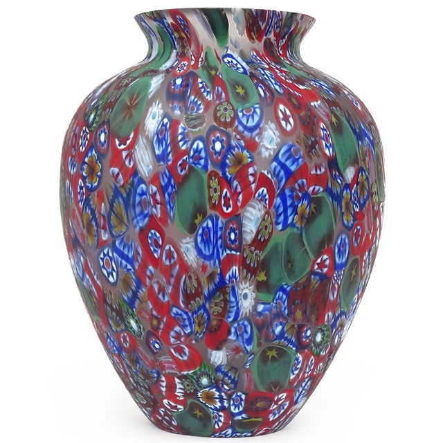 Beautiful vintage Murano hand blown millefiori flower and stars mosaic Italian art glass flower vase. The vase is...