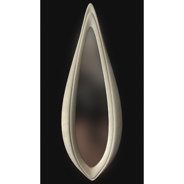 Mirror No. 2 is a large-scale wall-mounted mirror object designed by Chris Delmar. Its elongated vertical form combines a...