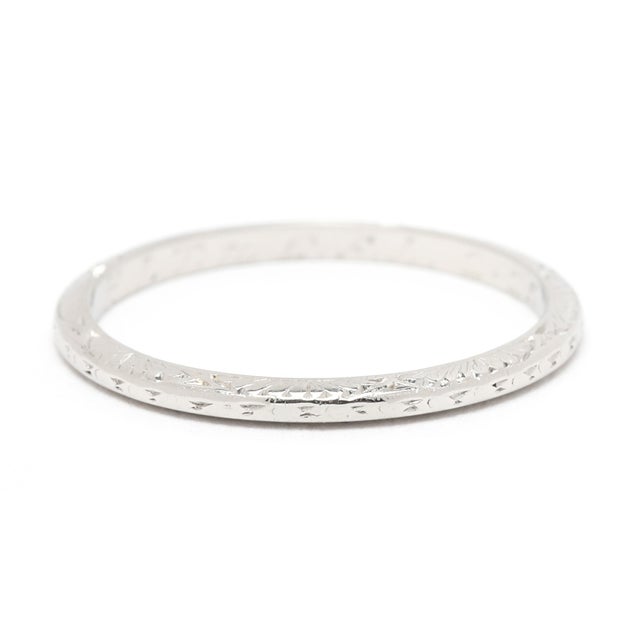 Ring Size 5.5 Rise off of Finger: 1.4 mm Width: 1.5 mm Weight: 1.2 dwts. / 1.8 grams Stamps: "Plat" SKU: R4162 A Couple Of...