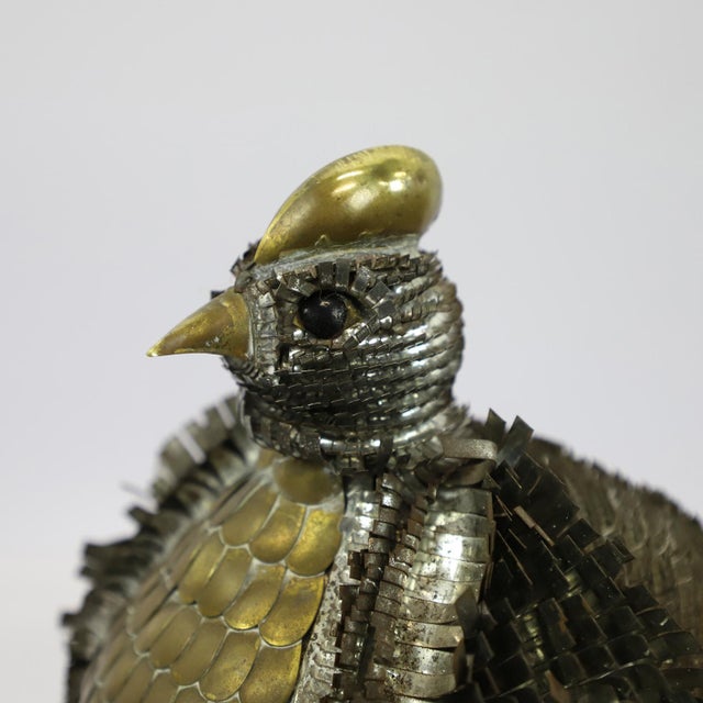Circa 1970. We offer this Sergio Bustamante style mixed metal Peacock sculpture. With his graphic design of curled metal...