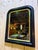 A napoleon iii period mirror, circa 1850-1880, in blackened lacquered wood with a curved, molded profile. the frame...