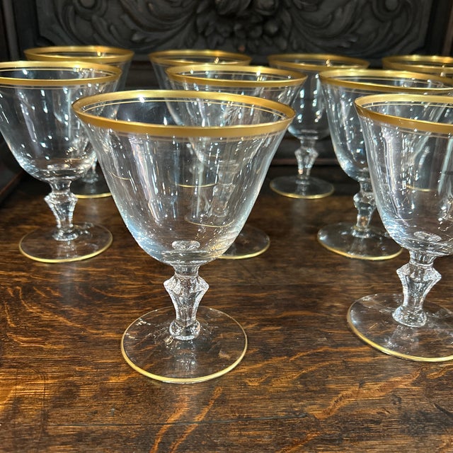 Stunning set of 10 tiffin crystal glasses 24k gold trim. Can be used for wine. Perfect for upcoming holidays
