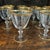 Stunning set of 10 tiffin crystal glasses 24k gold trim. Can be used for wine. Perfect for upcoming holidays