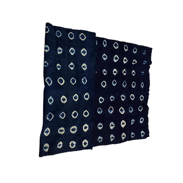 This fabric is woven by the skilled hands of the Mossi people in Burkina Faso. It is a rare and unique traditional...