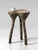 Sculptural concrete tripod low side table in mottled beige by donatas žukauskas a sculptural concrete side table on three...