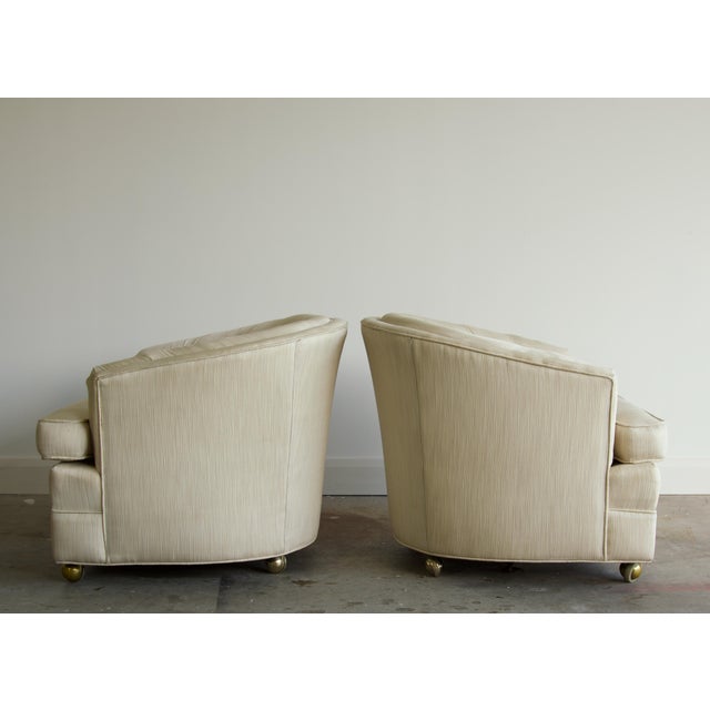 Pair, Rolling Cream Tufted Barrel Back Club Chairs on Brass Casters, 1970's For Sale - Image 4 of 8