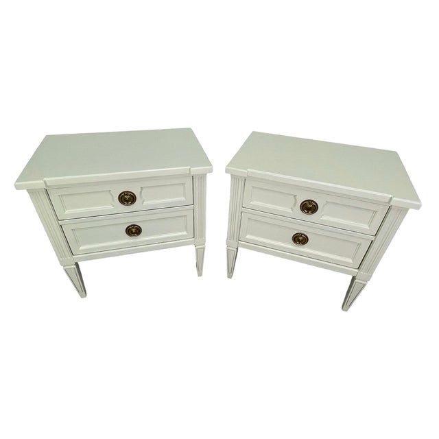 Recently refinished pair of nightstands by American of Martinsville, dating to the 1970s. Finished in a soft off-white...