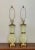 Rare and elegant pair of mid century Hollywood Regency bronze-mounted uranium glass lamps by Paul Hansen. Gorgeous lamps...