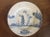 Antique 18th c. English Delft charger or round platter with Chinoiserie decoration showing figures in a landscape. A...