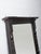 This wooden mirror frame from India showcases a beautifully aged dark finish and 20th-century craftsmanship. The frame...