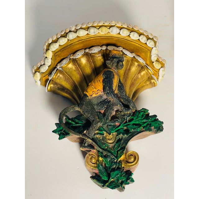 Vintage whimsical pair of monkey servants wall brackets / corbells decorated with round miniature sand dollars and sea...