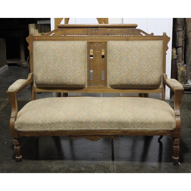Late 19thc. Eastlake “Mayan” Settee Chairish