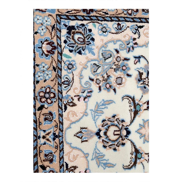 Beautiful hand-knotted Nain rug made from wool and silk. Nain is a small village located in central region that has...