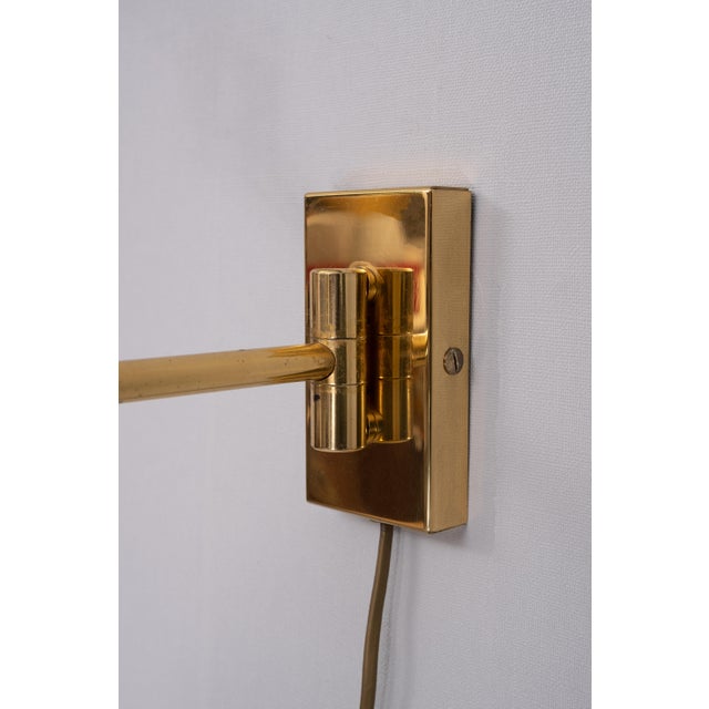 Very nice and rare Brass swing arm wall lamp. Good quality one large E27 bulb needed. Superb patina. European Plug (up to...